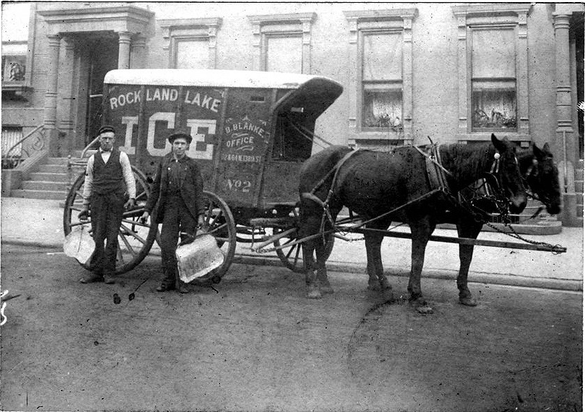 Photo of a horse drawn carriage delivering ice