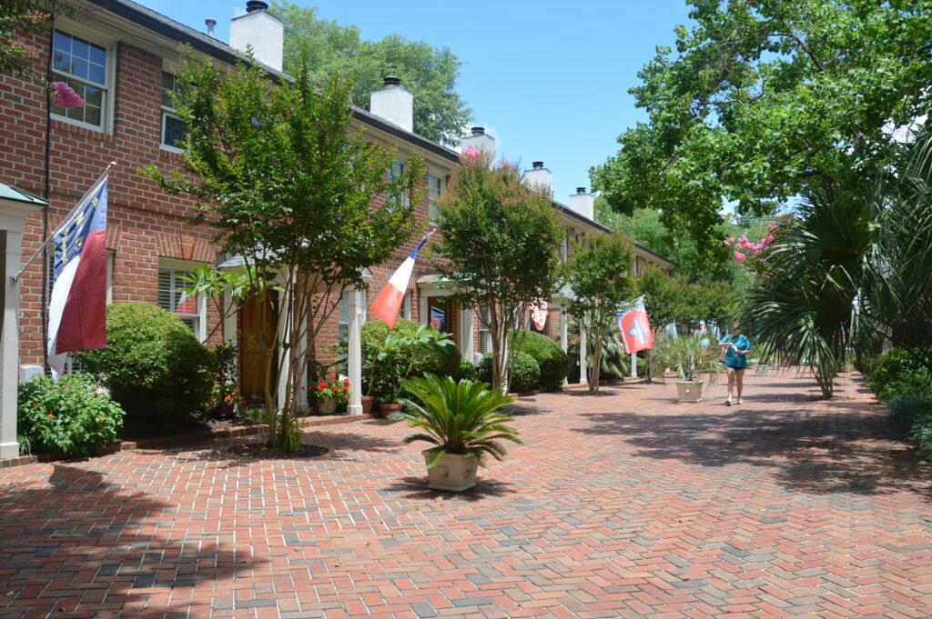 Photo of the red brick courtyard and row of condominiums at Wilmington Square